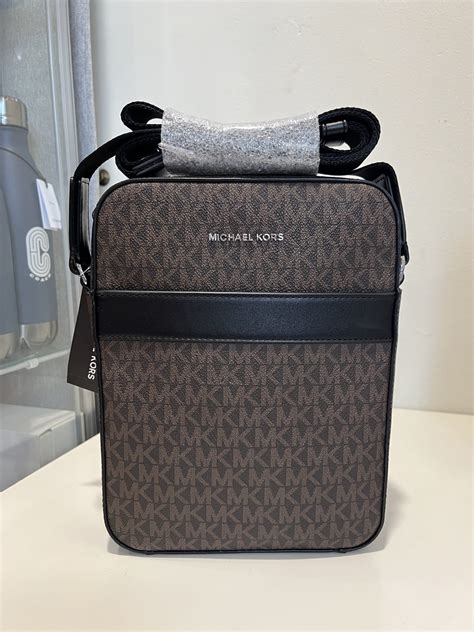 michael kors cooper flight bag|More.